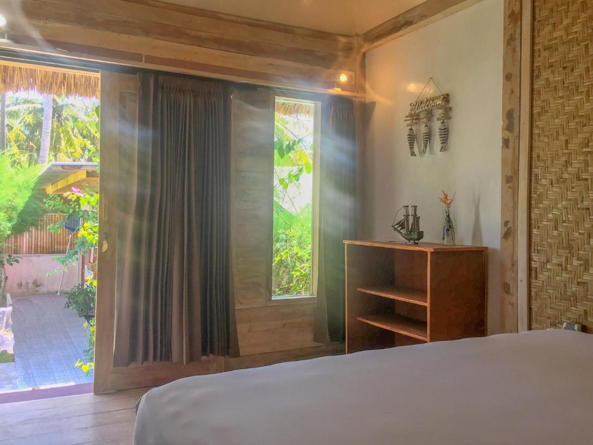 The Huts Villa กีลีตราวางัน ภายนอก รูปภาพ